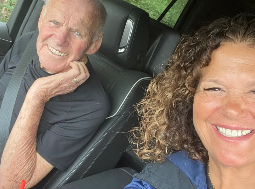 A shared laugh on the drive home with a Peach Remedy caregiver